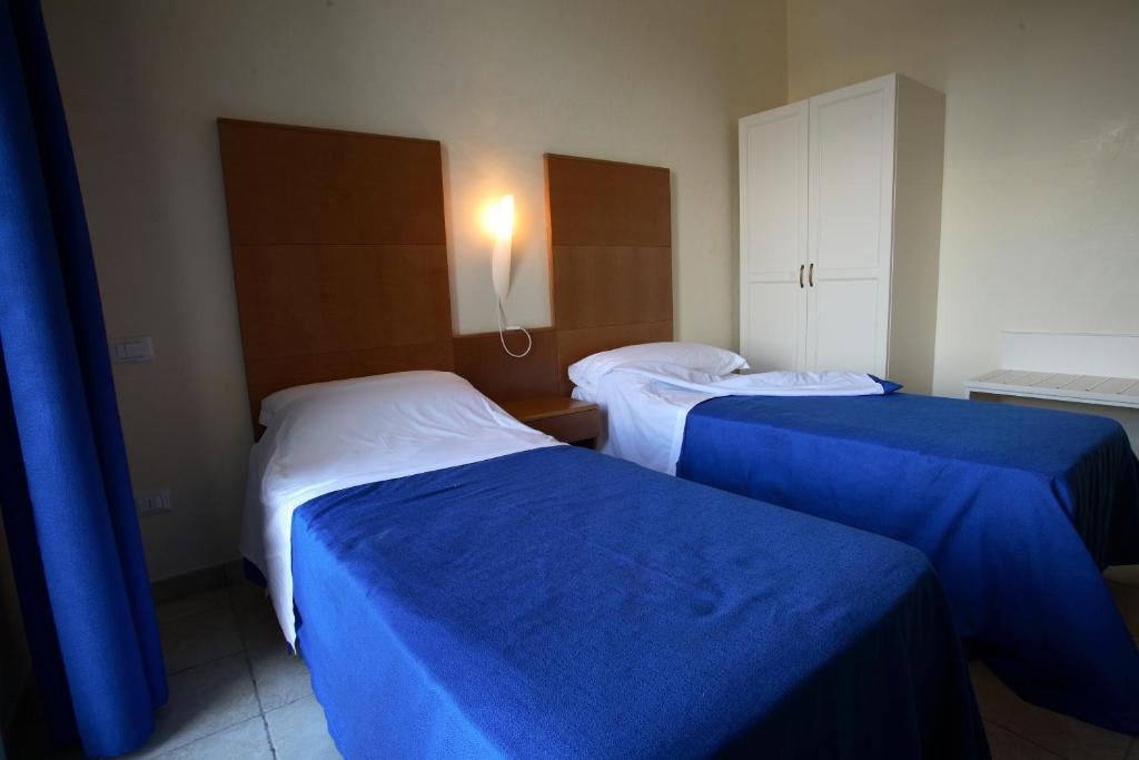 Camera Matrimoniale/Doppia con Letti Singoli